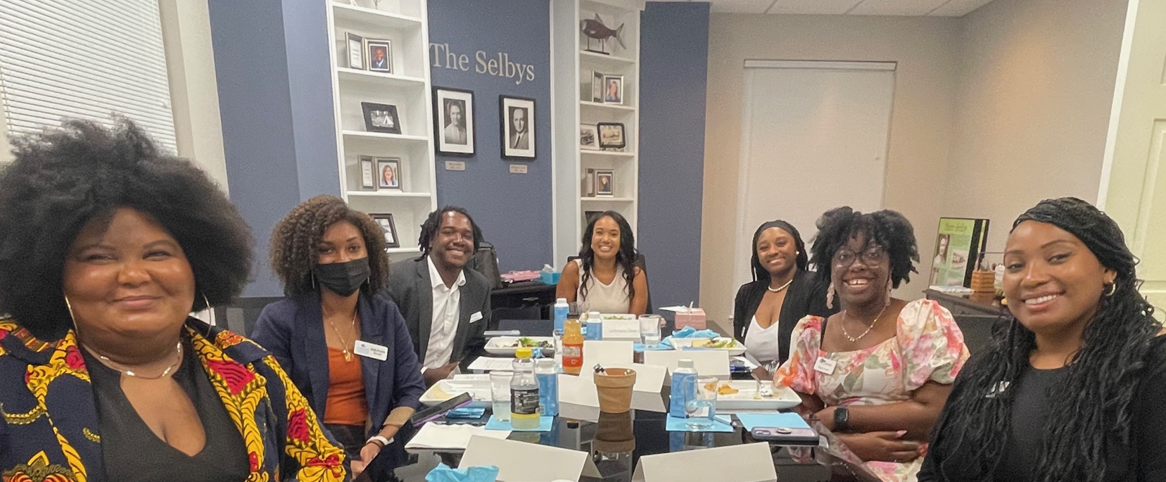 Members of the Black Professionals in Philanthropy Group had lunch with LaKoya Gardner (seated in center) at the Selby Foundation during her time in Sarasota to talk about professional development and lessons from the field.